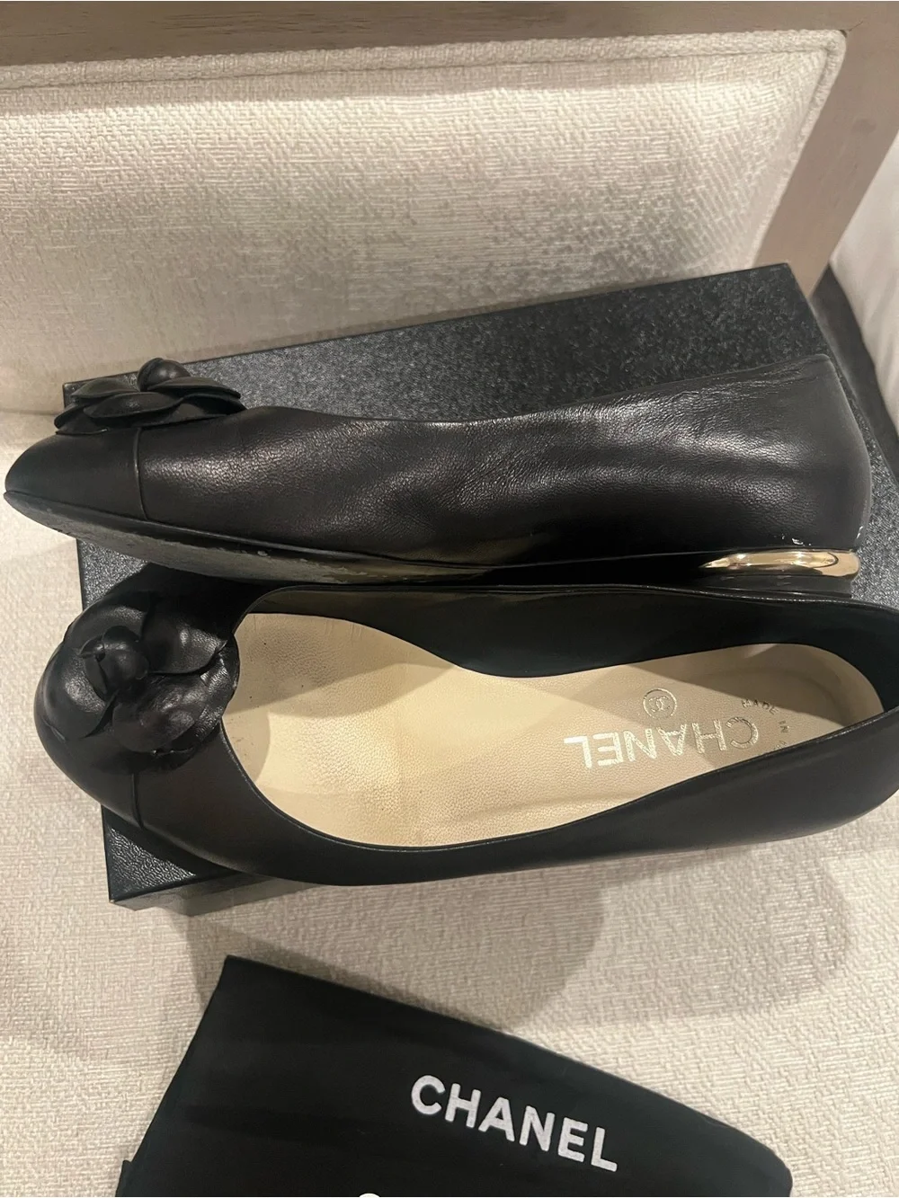 CHANEL Black Leather Camellia Round-Toe Flats